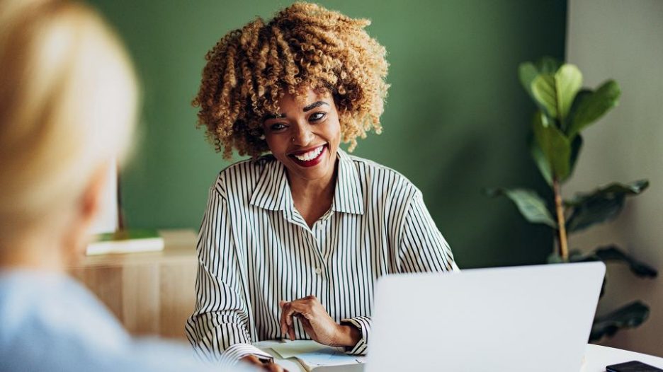 two women having a meeting in an office