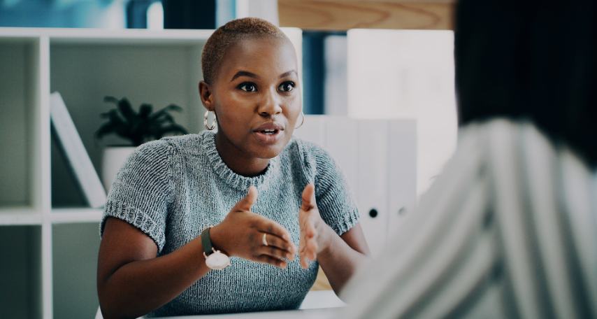 a professional woman engaged in a very focussed conversation