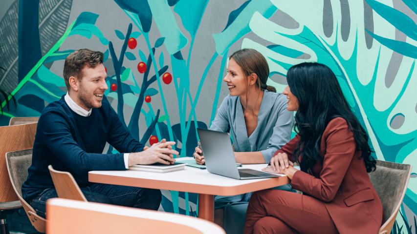 businesswomen and businessman in meeting