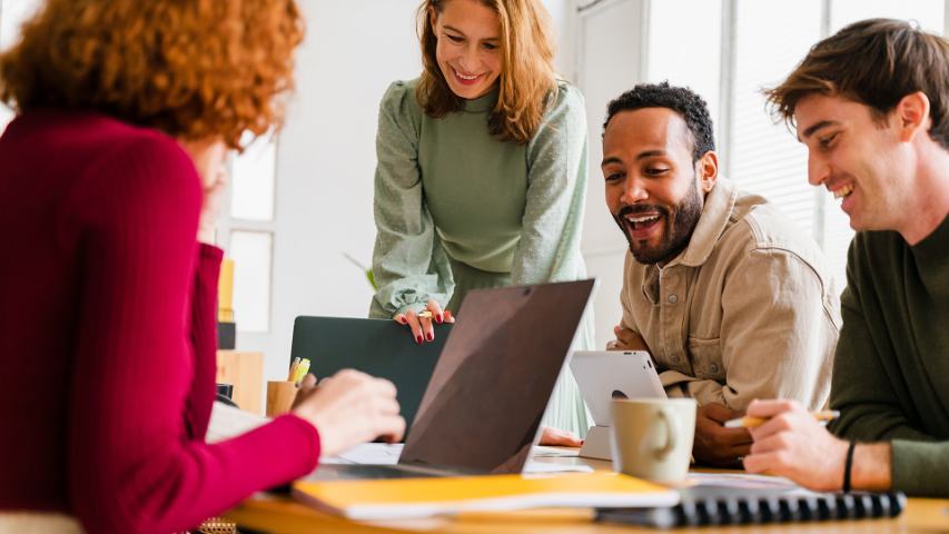 group of colleagues at a table working