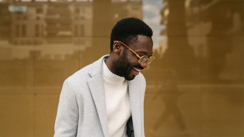 young man in smart casual outfit on street