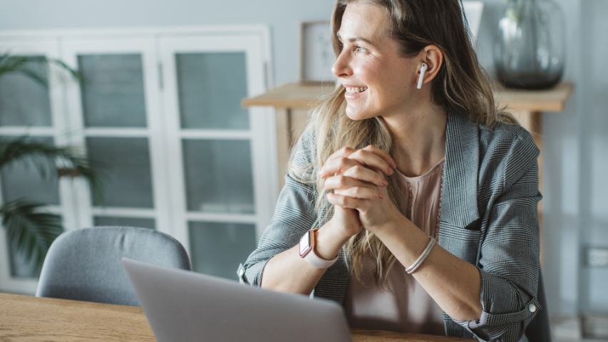 Business woman participating in webinar from home