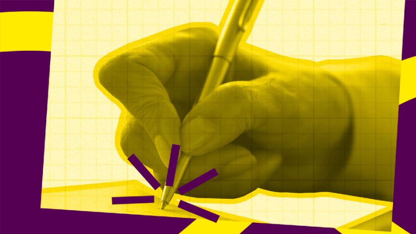 Hand writing with pen on a paper